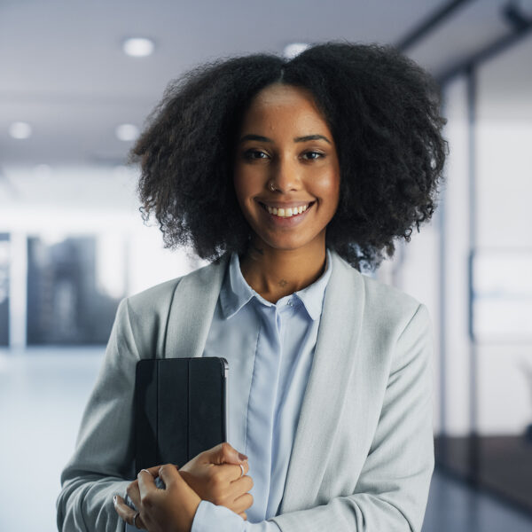 Portrait,Of,Beautiful,African,Female,Dressed,In,A,Casual,Suit